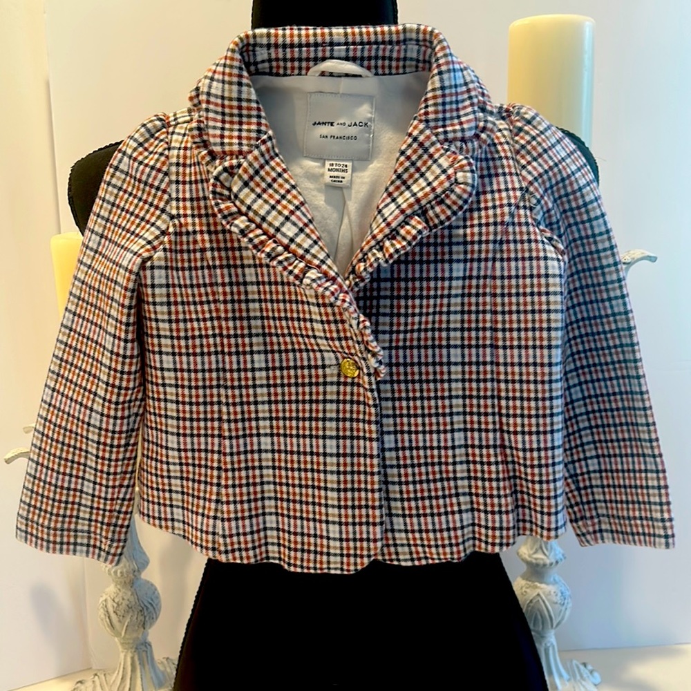 Janie and Jack San Francisco plaid blazer with crested button. Bodice is lined.